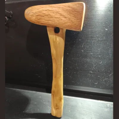 An image of a wooden hammer